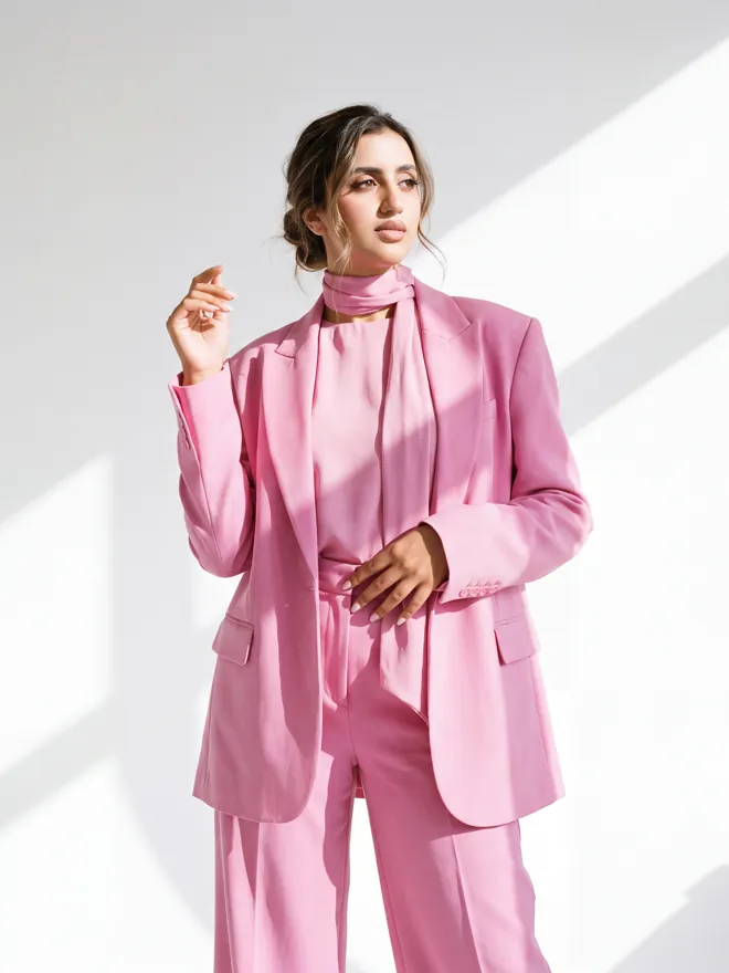 Haneen in a pink suit, full length